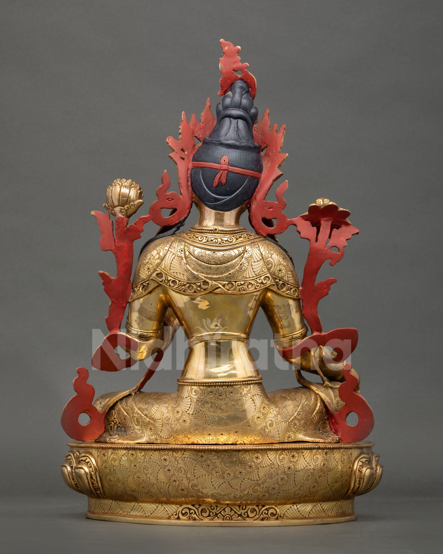 Back view of handcrafted Green Tara statue showing detailed copper metalwork gold gilded finish and traditional Nepalese artistry
