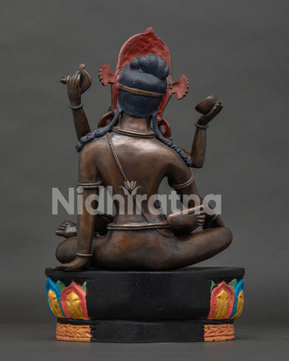 Back view of handcrafted Indra with consort statue by Newari artisans.