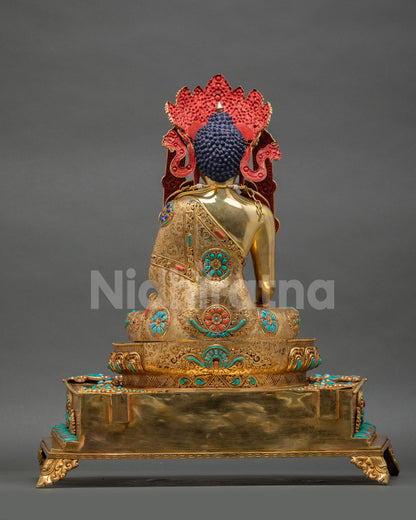 Back view of handcrafted Jowo Rinpoche statue, Nepal, copper alloy gold gilding,  intricate carvings throne, sacred meditation decor
