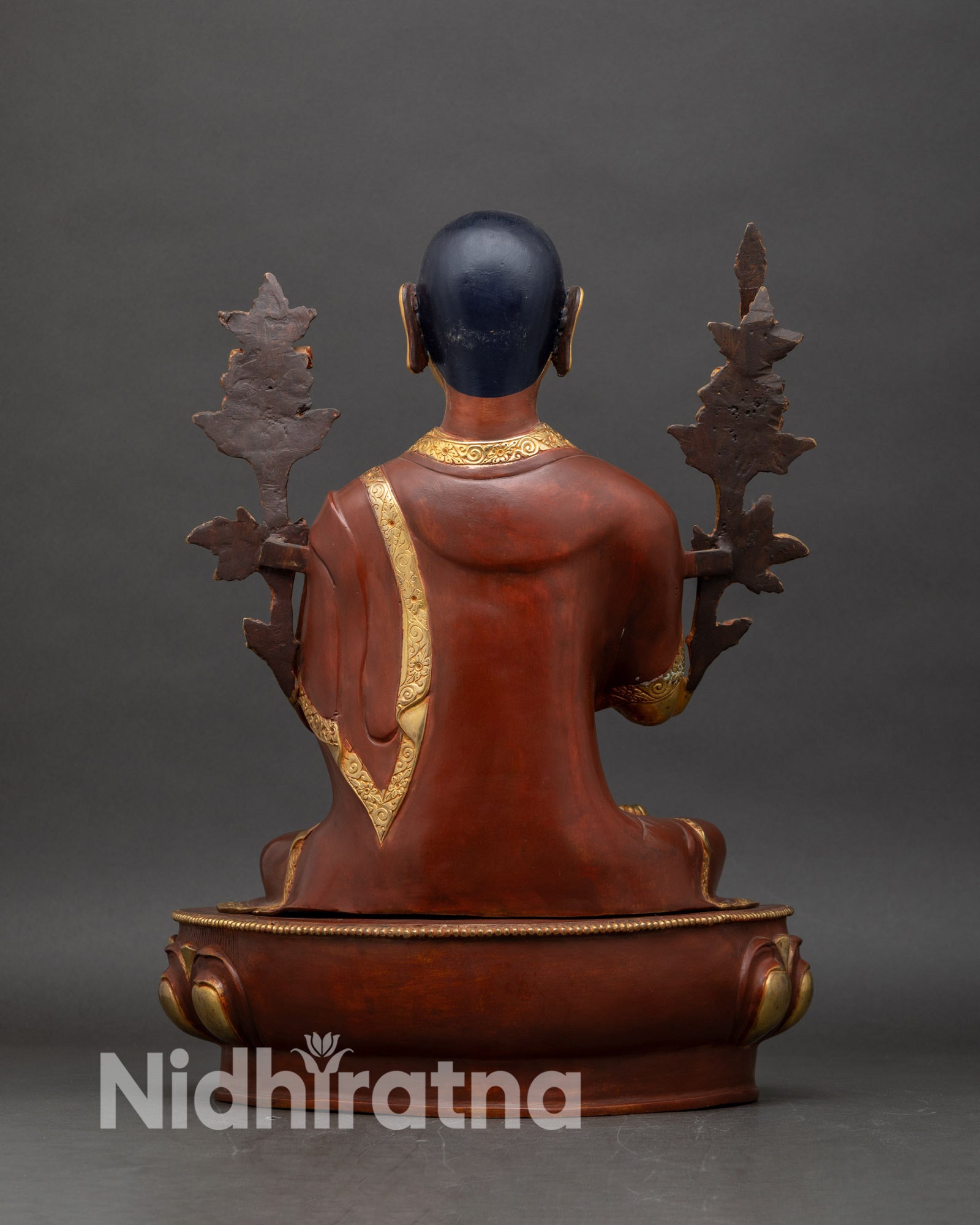 Back view of handcrafted Tsongkhapa statue set from Patan Nepal oxidized copper sculpture gold gilded details sacred Himalayan Buddhist lineage art