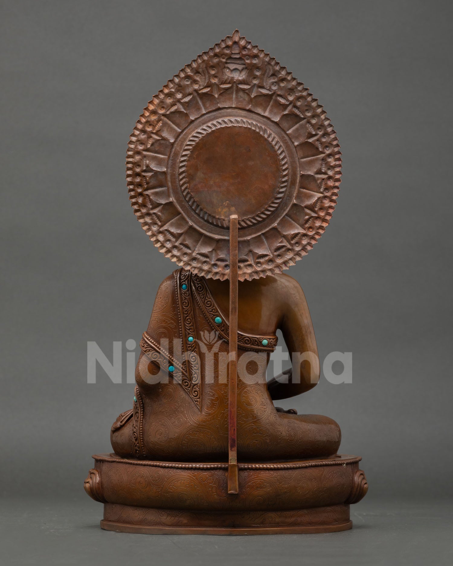Back view of handmade Amitabha Buddha statue from Nepal showcasing copper artistry and sacred Himalayan Buddhist details
