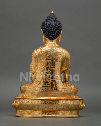 Back view of handmade Buddha Shakyamuni statue for meditation space Buddhist altar decor with copper body and 24K gold gilded finish