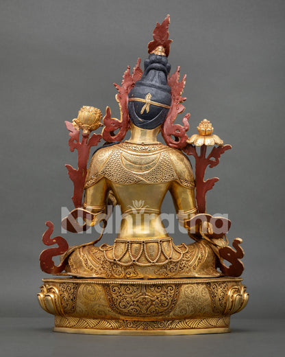 Back view of handmade Green Tara statue with floral scrollwork copper and gold fire gilded finish from Nepal