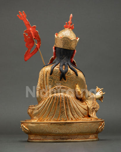Back view of handmade Guru Rinpoche statue, intricate robe detailing, sacred Himalayan Buddhist art decor