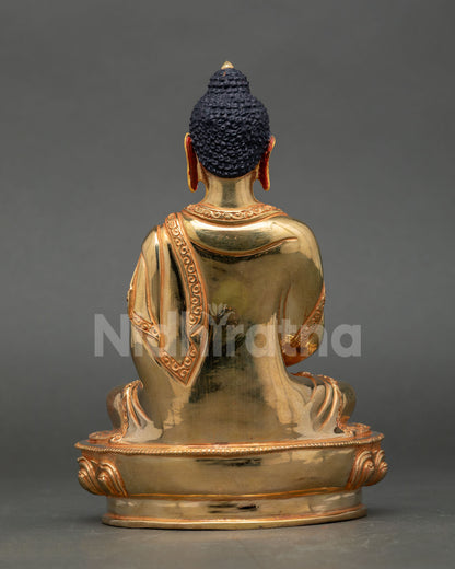 Back view of handmade Nepalese Amitabha Buddha sculpture with gold fire gilding