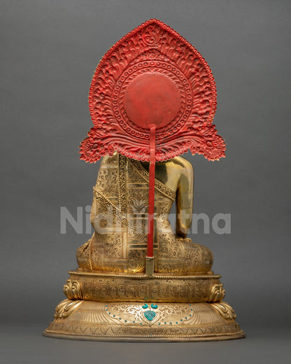 Back view of handmade Shakyamuni Buddha statue with decorative halo and copper craftsmanship