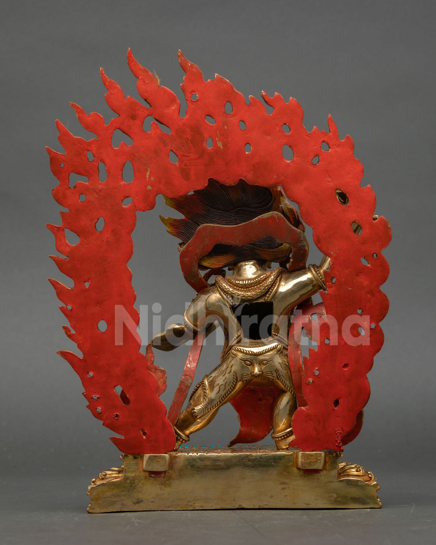 Back view handmade Vajrapani statue showcasing flaming halo intricate craftsmanship and Nepalese artistry