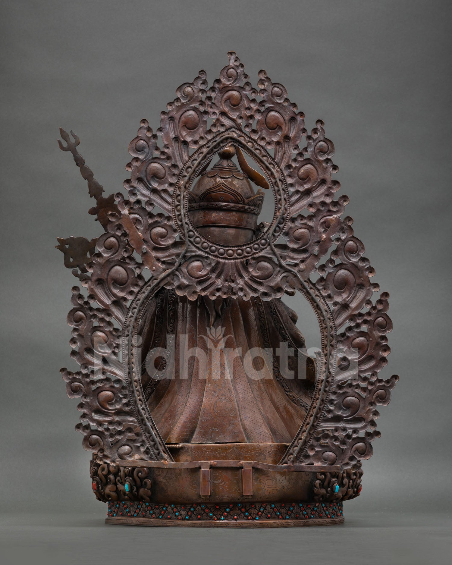 Back view of Himalayan Guru Rinpoche sculpture with lotus pedestal and traditional Newari craftsmanship