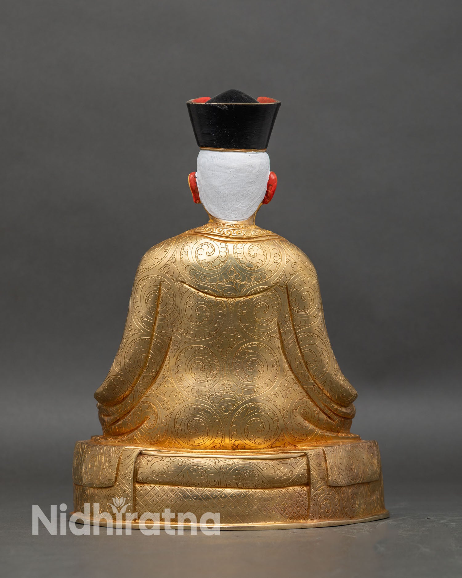 Back view Karmapa statue seated on lotus pedestal for meditation and altar decor