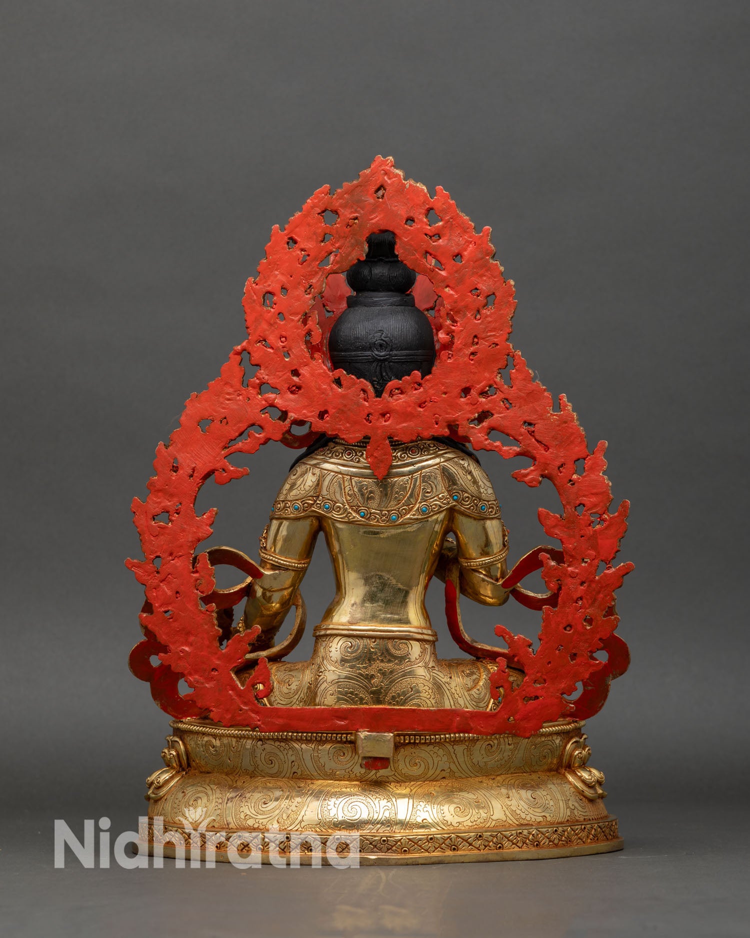 back view ksitigarbha statue showing hand-carved lotus pedestal and floral halo