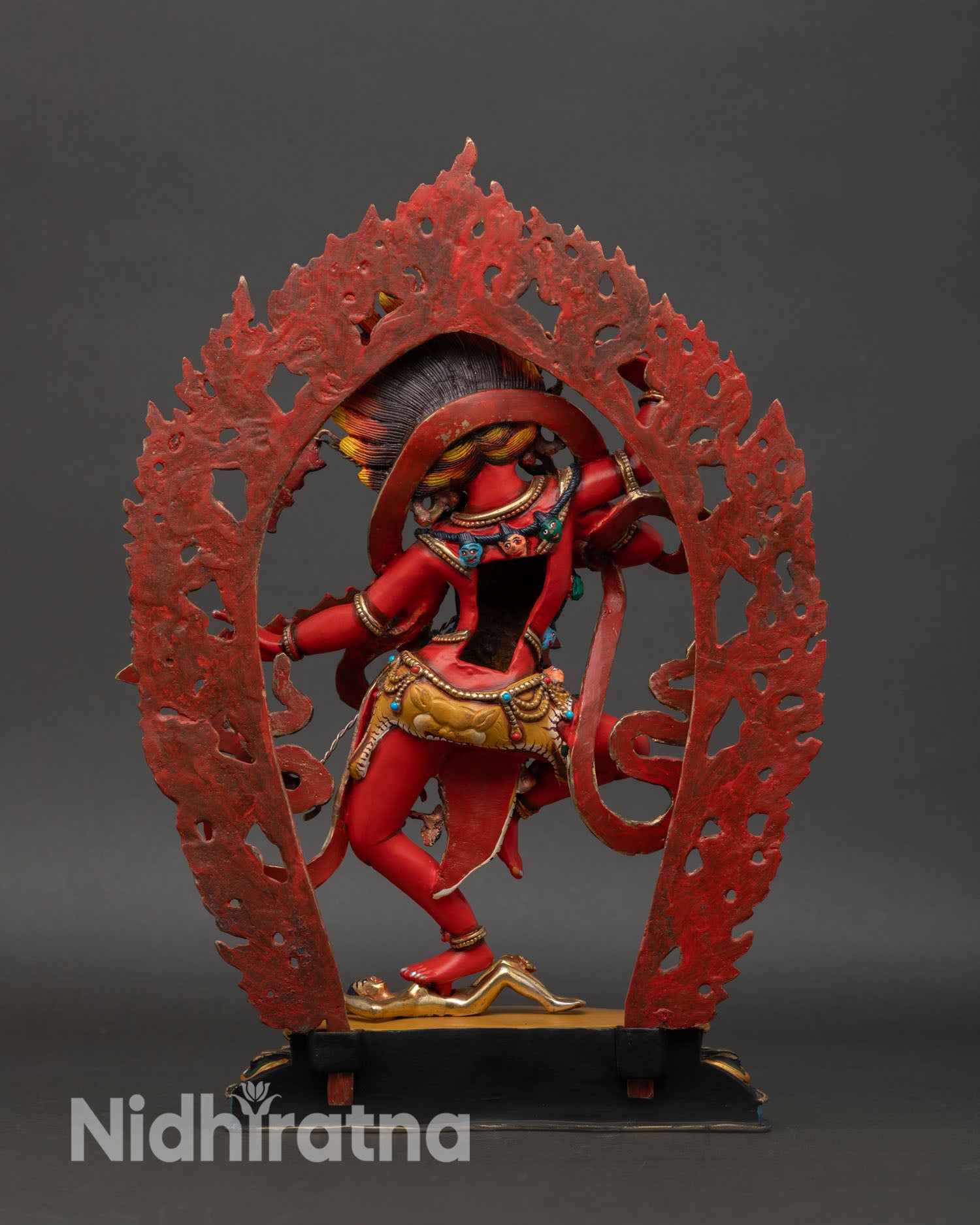 Back view of Kurukulla statue handmade copper Nepal sculpture with sacred Buddhist symbolism for meditation space altar