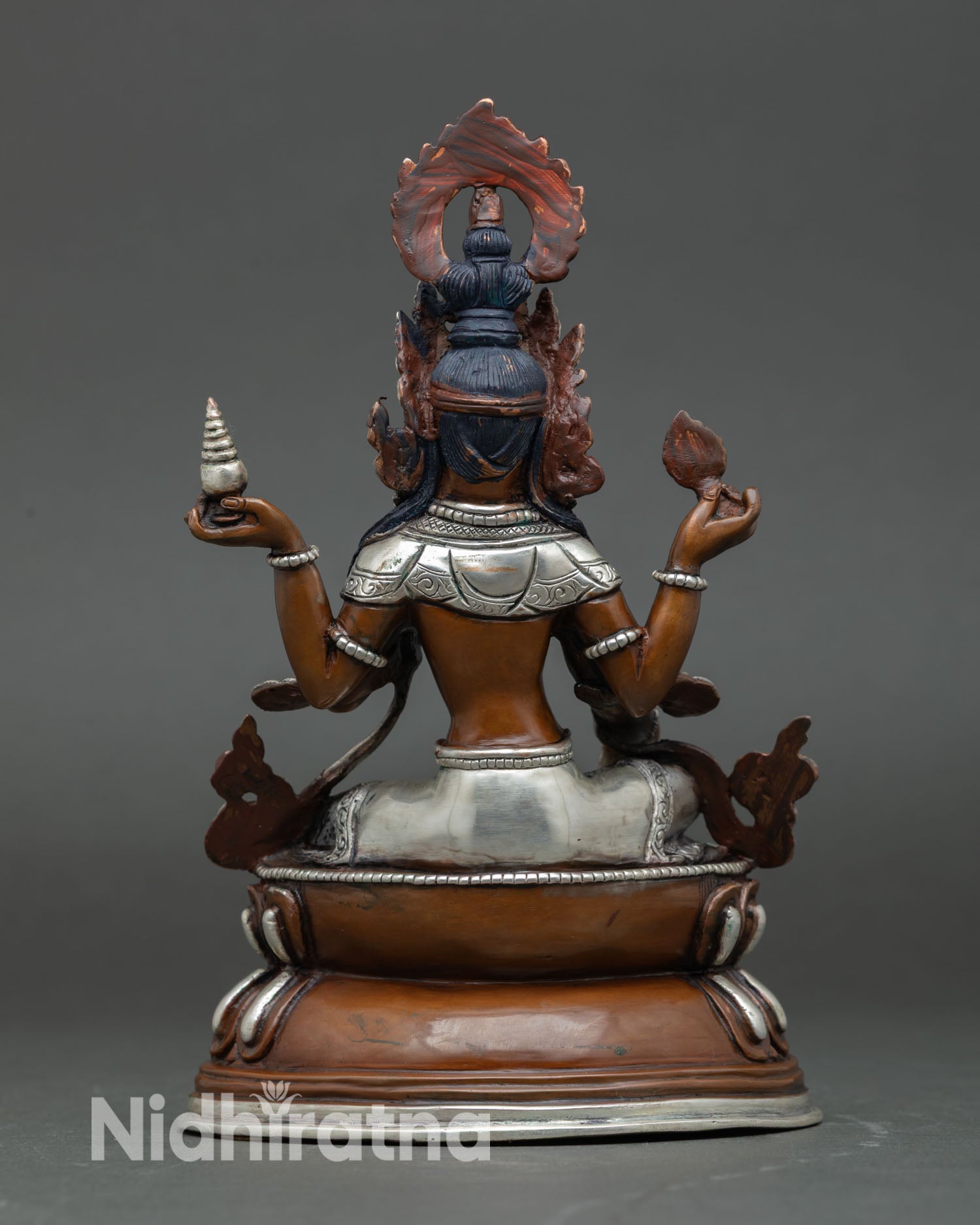 Back view of Lakshmi statue double lotus throne detail oxidized silver plated finish Nepalese Newari artisan craftsmanship
