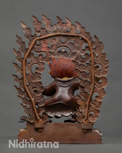 Back view of Mahakala Bernagchen sculpture intricate detailing copper artwork Tibetan protector deity ritual meditation altar spiritual decor