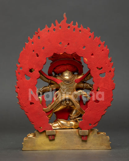 Back view of Mahakala Buddhist statue from Nepal with intricate copper detailing fiery halo design reflecting traditional Newari lost wax metal artistry.