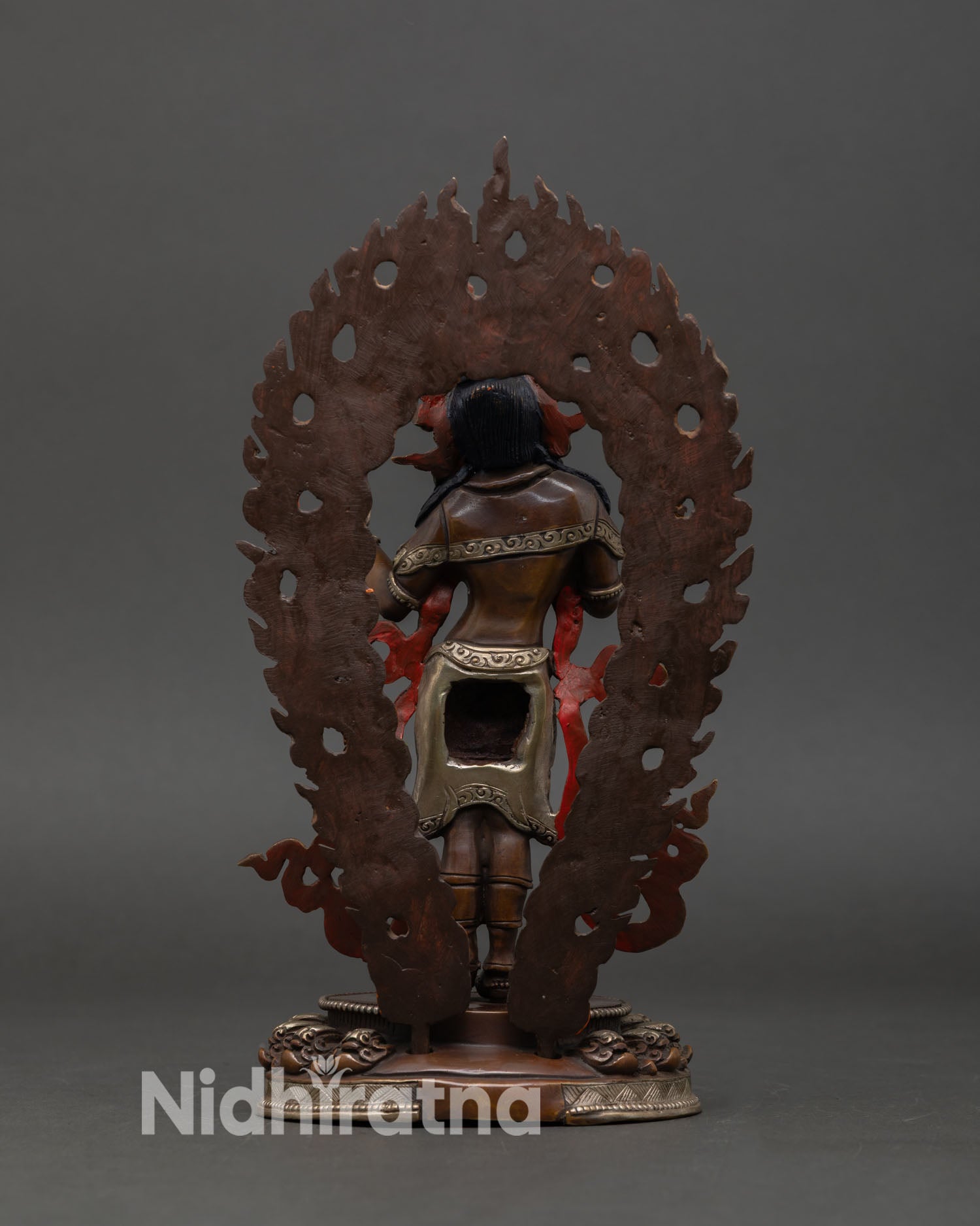 Back view of Mandarava statue, Himalayan Buddhist dakini art, Patan handmade copper figure, silver plated detailing, sacred Vajrayana altar sculpture