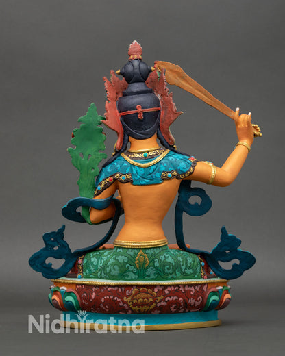 Back view Manjushri statue flowing garments lotus pedestal traditional Newari craftsmanship sacred Buddhist altar art