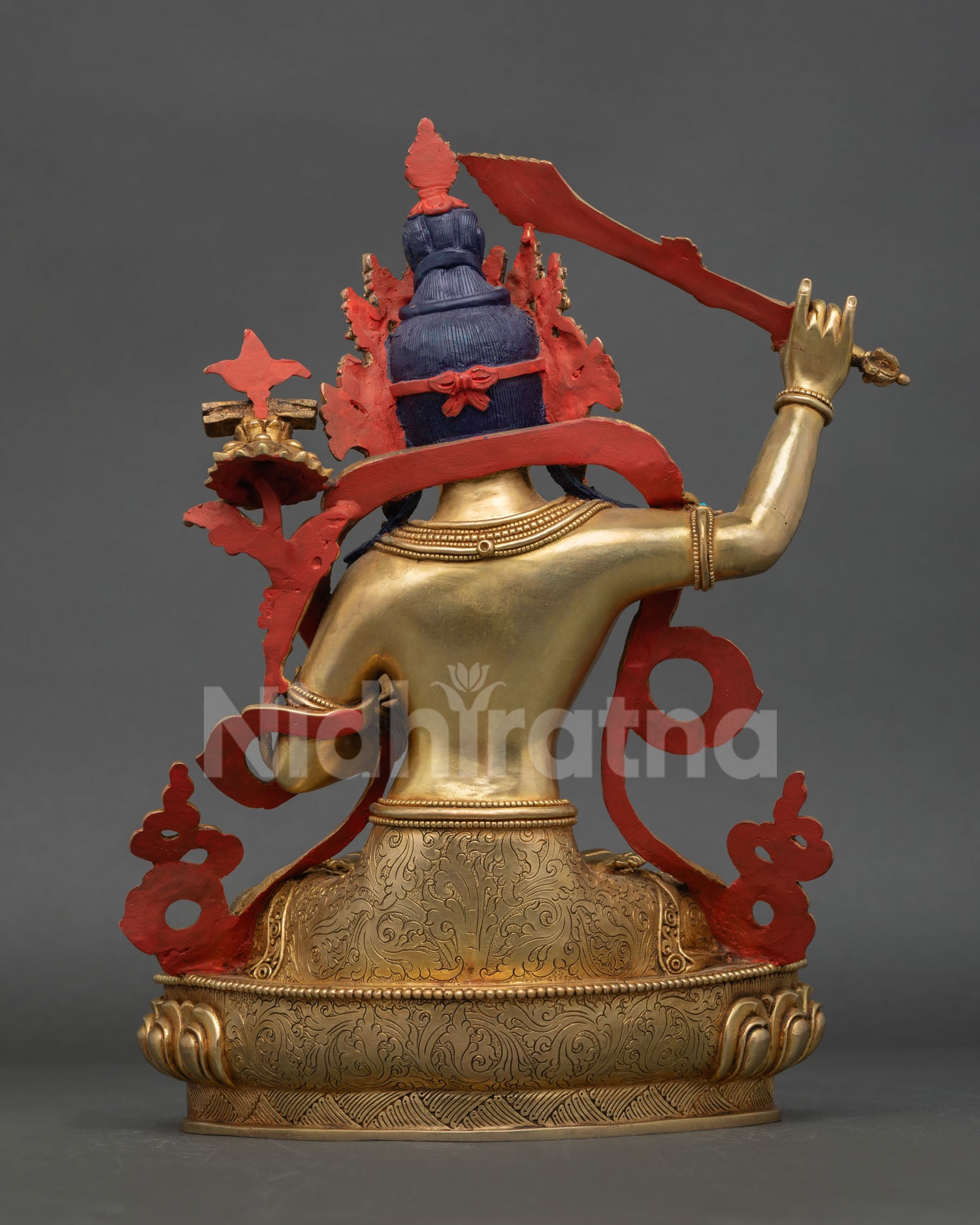 Back view of Manjushri Statue, handmade fire gilded Buddhist art by a Newari artisan from Patan, Nepal
