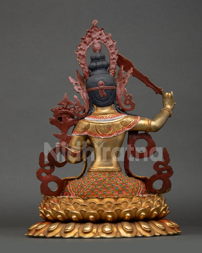 Back view of Manjushri statue lotus throne halo design Himalayan craftsmanship sacred altar sculpture wisdom deity Nepal handmade spiritual interior decor