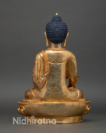 Back view of Medicine Buddha statue intricate floral patterns Nepalese lost-wax craftsmanship