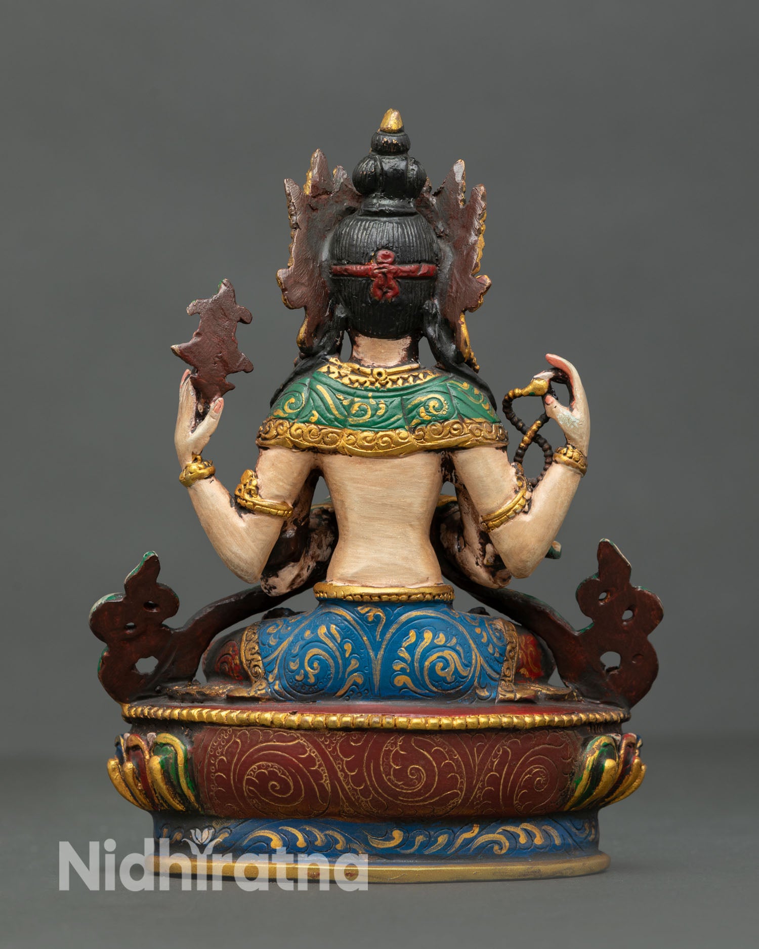 back view mini chenrezig statue with intricate copper work and sacred buddhist design details