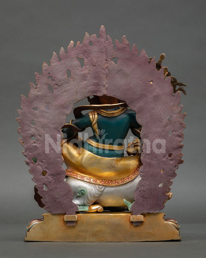 Back view Namtoshe statue Nepal handcrafted copper sculpture showing intricate back detailing halo