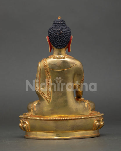 Back view of Nepalese Buddha Shakyamuni statue gold gilded copper finish sacred Himalayan Buddhist shrine decor