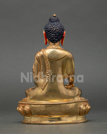 Back view of Nepalese Buddha Shakyamuni Statue with gold gilded details designed for Buddhist shrine and sacred altar decor