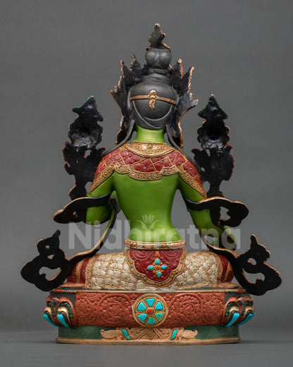 Back view of Nepalese Green Tara sculpture with ornate carvings lotus base and traditional Newari artistry