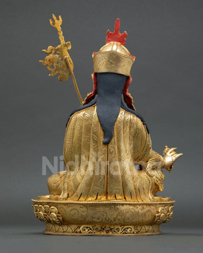 Back view of Nepalese Guru Rinpoche sculpture with detailed metalwork Vajrayana iconography and spiritual altar design