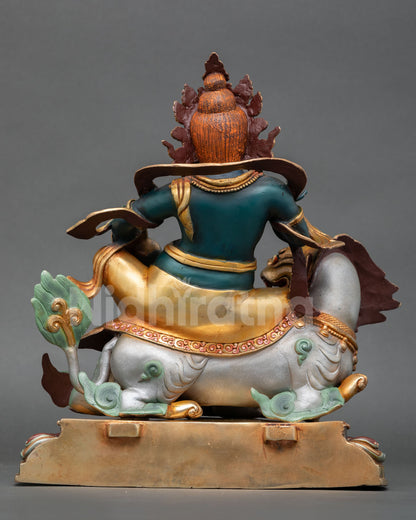 Back view of Nepalese Namtoshe sculpture with lost wax metalwork flowing robes and spiritual altar craftsmanship