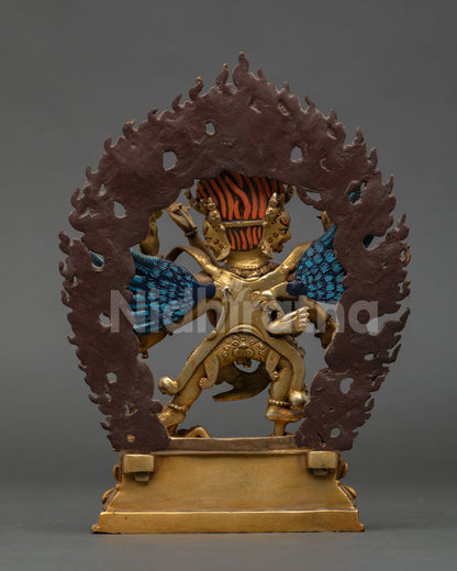 Back view of Nepalese Vajrakilaya statue with dynamic flaming halo copper base and hand painted details for meditation space