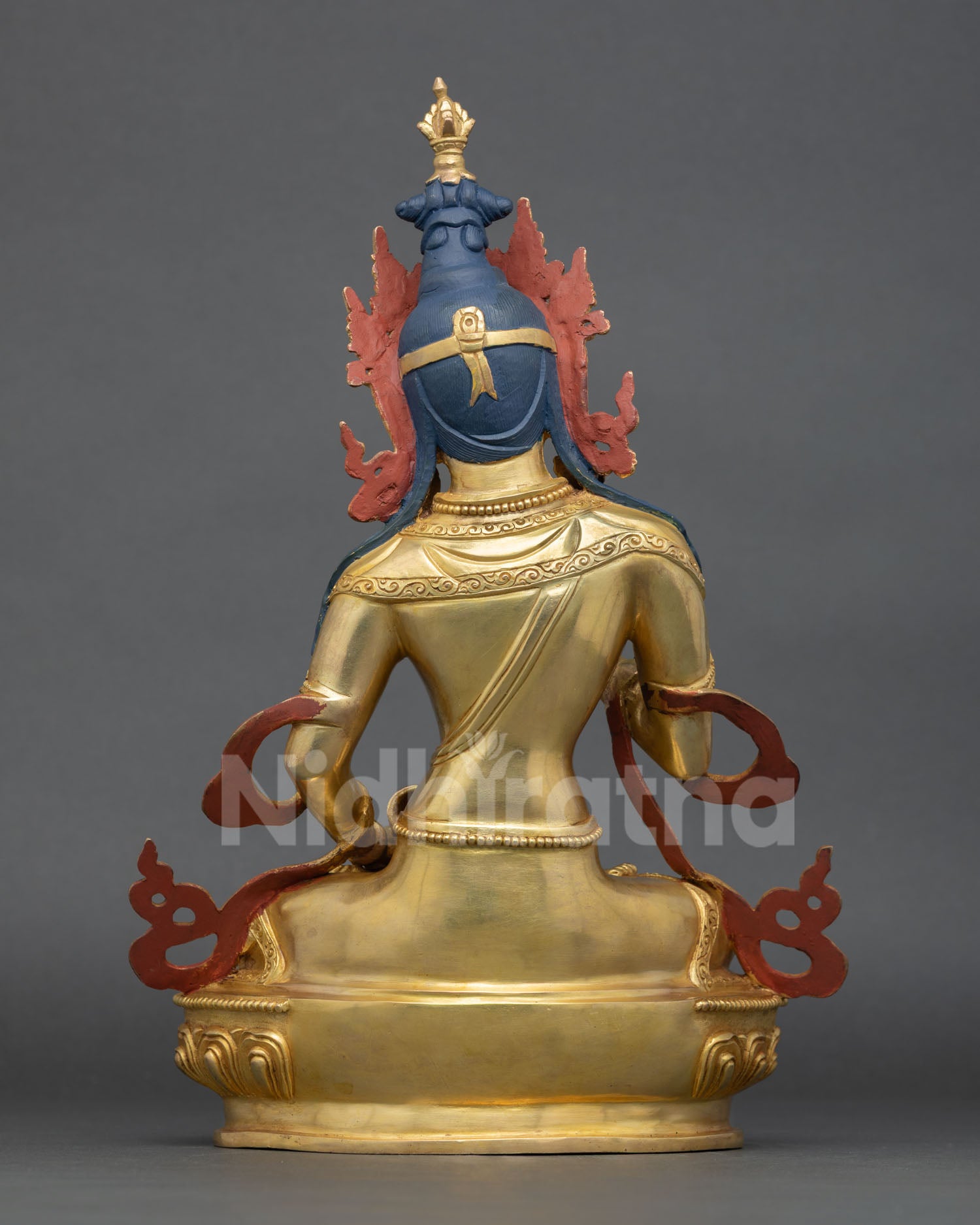 Back view of Nepalese Vajrasattva meditation statue with lost wax metalwork and engraved robe detailing
