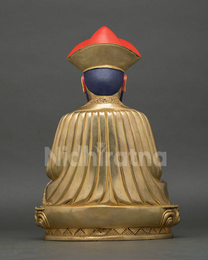 Back view of Ngawang Namgyal statue showing detailed monastic robe patterns