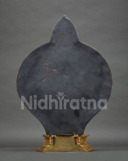 Back view of 1000 Arm Chenrezig statue with smooth halo reverse and gilded stepped base, handmade in Nepal