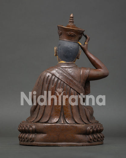 Back view of 16th Karmapa Statue handcrafted by Newari artisans using lost wax casting technique