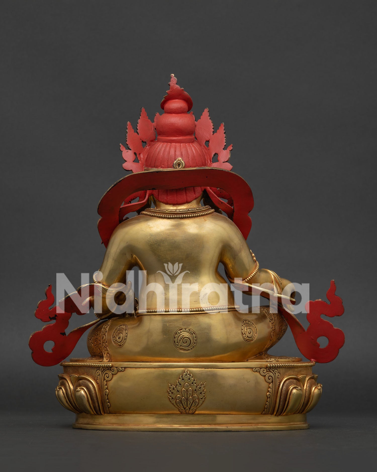 back view of 24K gold fire-gilded Yellow Dzambhala statue with detailed Nepali sacred metalwork