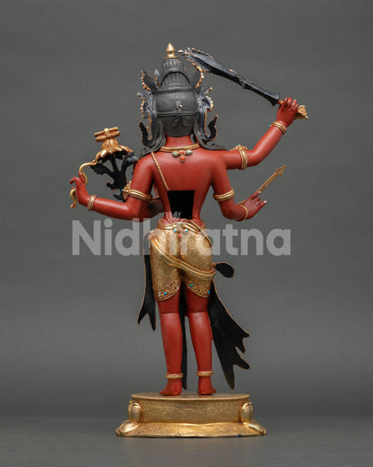 Back view of 4-Armed Maha Manjushri copper statue with gold gilding