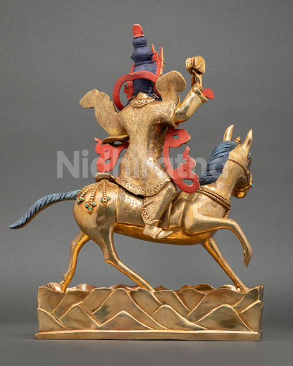 back view of achi chokyi drolma statue with detailed robes and decorative base engravings