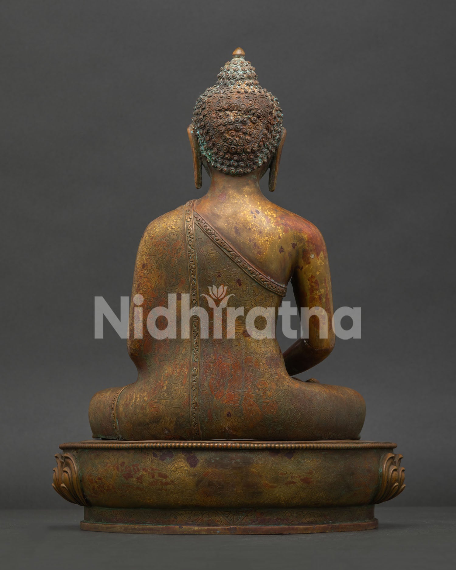 Back view of Amitabha Buddha statue featuring detailed floral robe carving and traditional Nepalese artisan work.