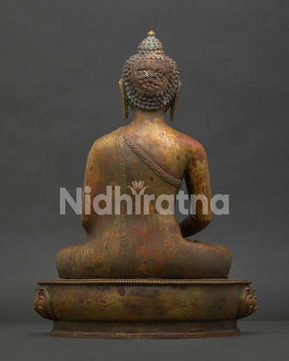 Back view of Amitabha Buddha statue featuring detailed floral robe carving and traditional Nepalese artisan work.