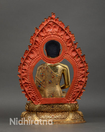 back view of amitabha buddha statue, ornate lotus seat and decorative halo details
