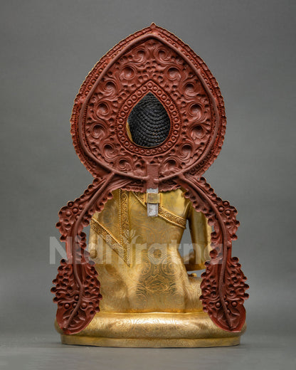 back view of amitabha buddha statue with engraved halo and copper craftsmanship