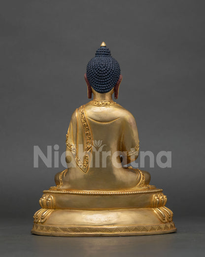 Back view of Amitabha Buddha statue with hand chased robe details and double lotus pedestal