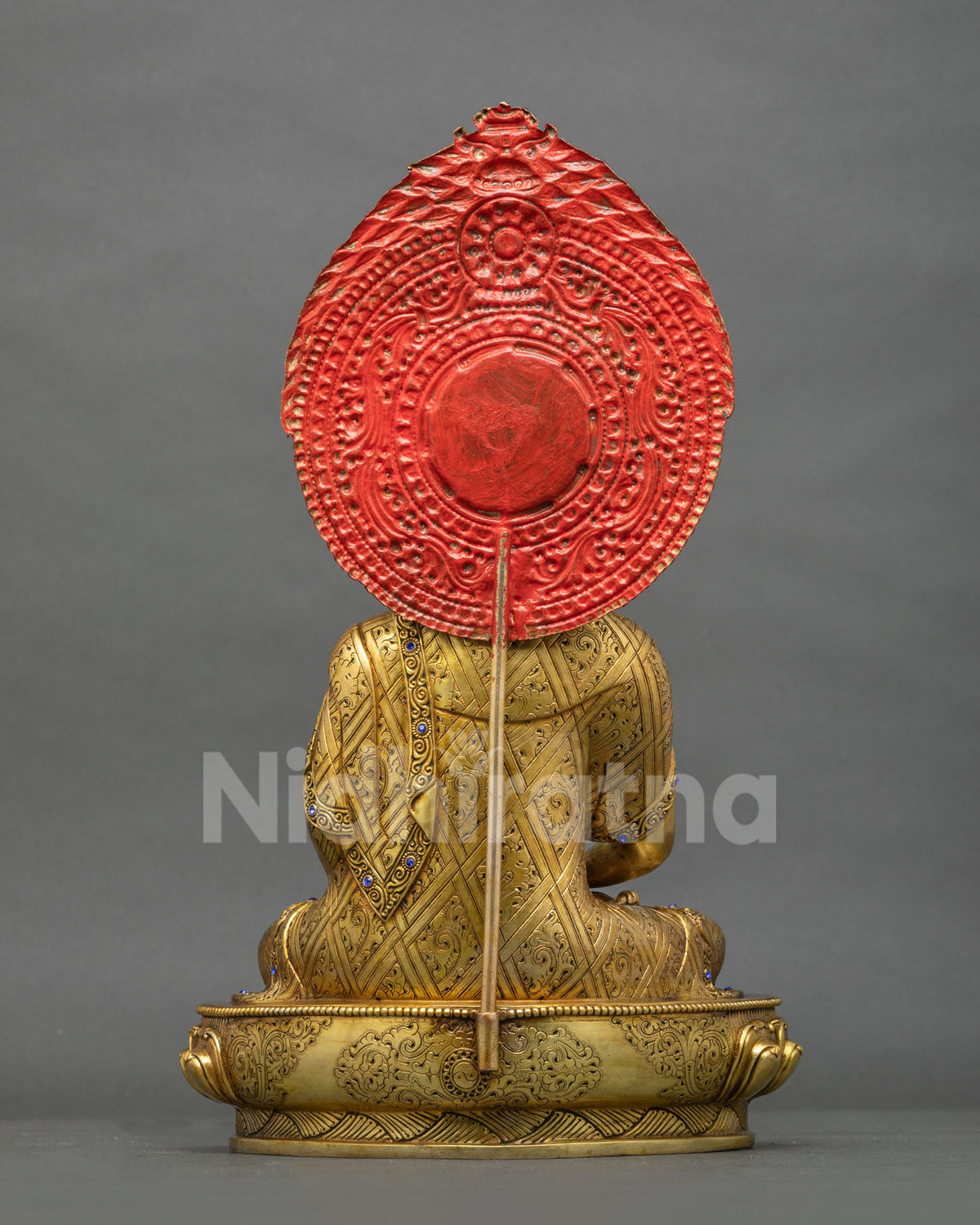Back view of Amitabha Buddha statue with hand-engraved robe and lotus base, handmade in Nepal