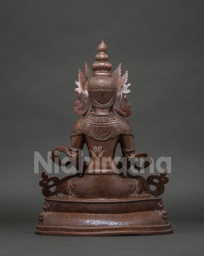 Back view of Amitayus Buddha statue showing lotus pedestal and robe detail