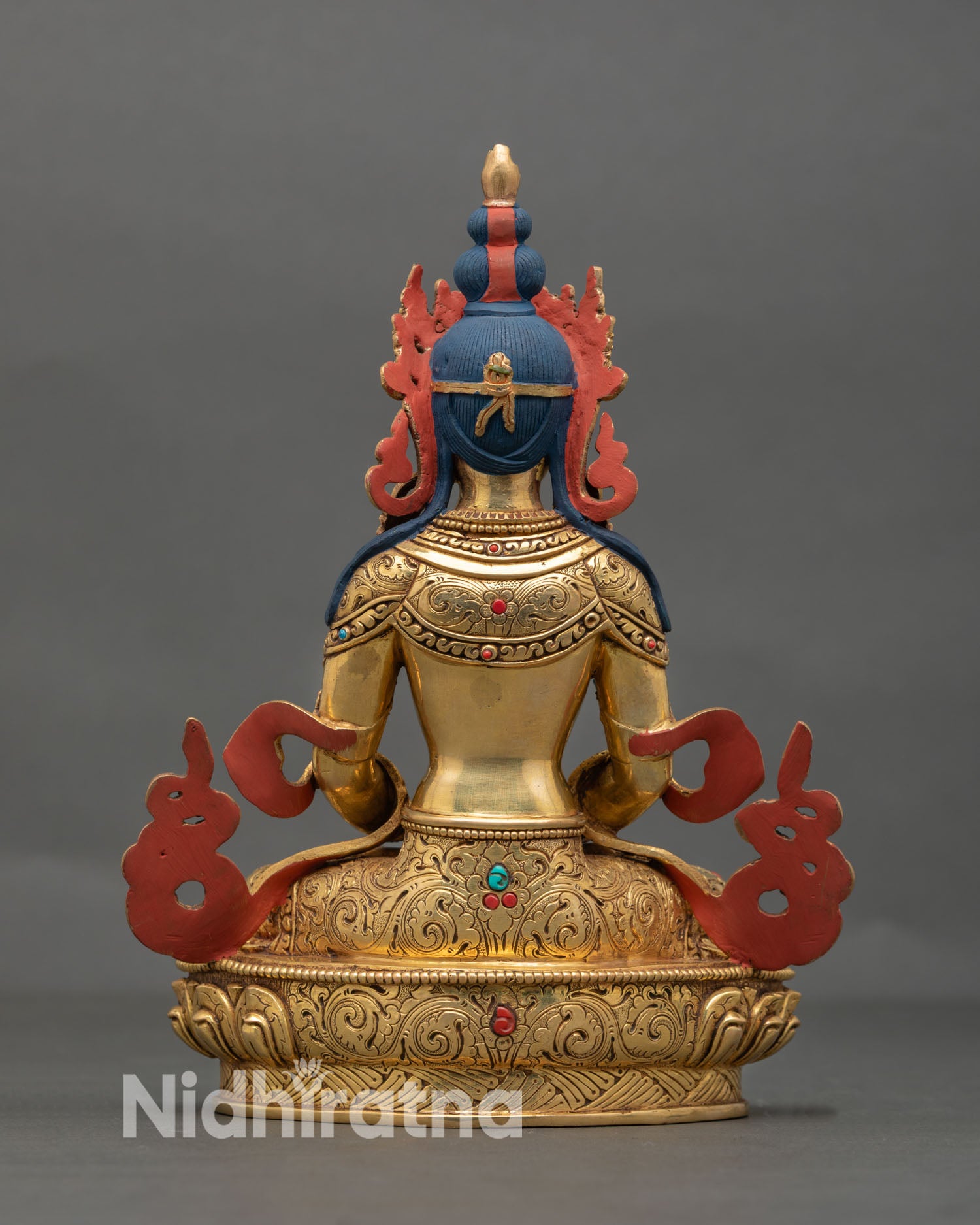 Back view of Amitayus statue highlighting ornate lotus base, fine lost wax casting details, and traditional Nepalese sacred metal sculpture design