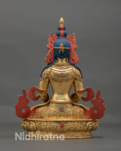 Back view of Amitayus statue highlighting ornate lotus base, fine lost wax casting details, and traditional Nepalese sacred metal sculpture design
