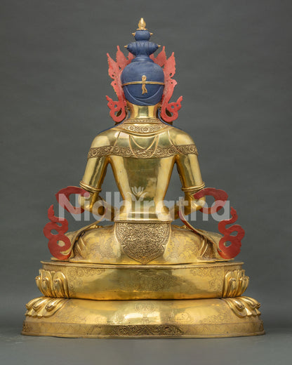 back view of amitayus statue, intricate carving work, ornate robes and finely detailed lotus throne