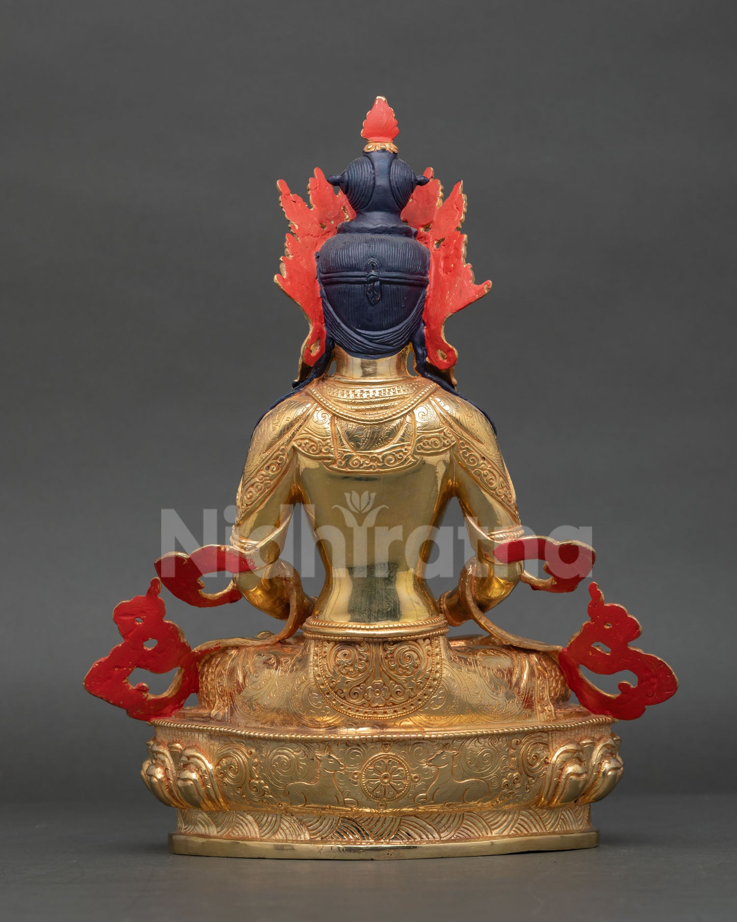 Back view of Amitayus statue showing handcrafted copper work and Nepalese artistry