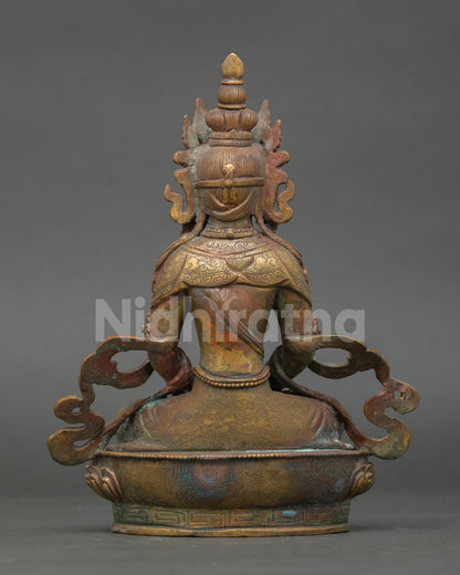 Back view of Amitayus statue showing ornate robes and handcrafted Himalayan design
